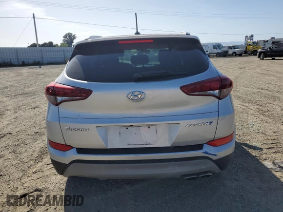 2017 Hyundai Tucson Sport z VIN KM8J33A26HU469865, wystawiony jako Copart lot #52766315 z przebiegiem 82 893 mil mil oraz Szkoda całkowita • Salvage title. Historia ofert i sprzedaży dostępna na DreamBid. Obrazek 6.