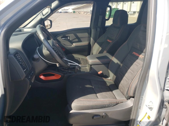 2022 Nissan Frontier Pro-4X with VIN 1N6ED1EK3NN676511, listed as a Copart auction lot 52030375 with 34,753 mi miles and Salvage title. Bid and sale history available at DreamBid. Image 7.