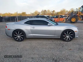 2014 Chevrolet Camaro LT z VIN 2G1FC1E36E9259754, wystawiony jako IAAI lot #41864556 z przebiegiem 118 443 mil mil oraz . Historia ofert i sprzedaży dostępna na DreamBid. Obrazek 13.