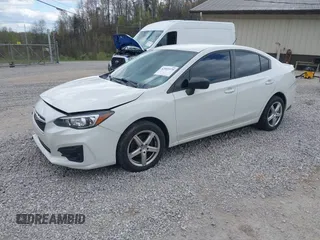 2019 Subaru Impreza with VIN 4S3GKAA6XK3607624, listed as a IAAI auction lot 42005570 with 136,026 mi miles and . Bid and sale history available at DreamBid. Image 2.