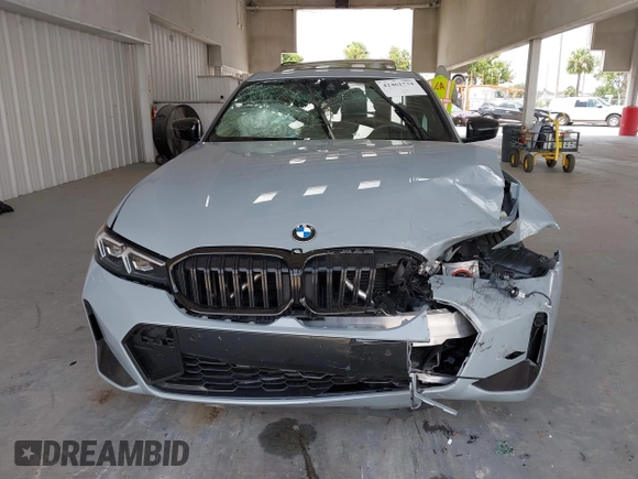 2023 BMW 3 Series 330i with VIN 3MW69FF01P8D33427, listed as a IAAI auction lot 42461734 with 15,587 mi miles and . Bid and sale history available at DreamBid. Image 12.