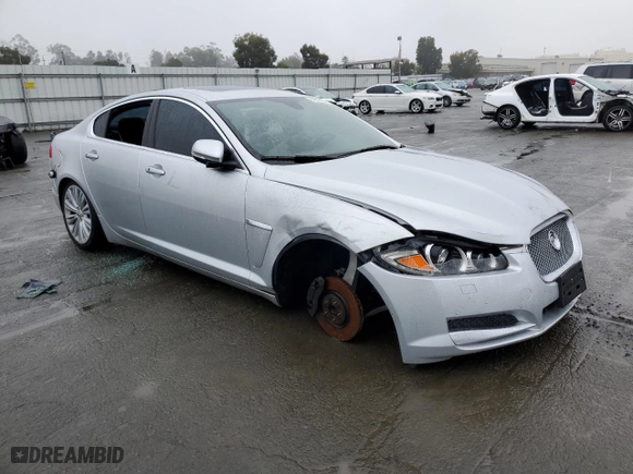 2012 Jaguar XF Portfolio with VIN SAJWA0HB8CLS41130, listed as a Copart auction lot 84322164 with 0 mi miles and Salvage Title. Bid and sale history available at carsss.com. Image 4.