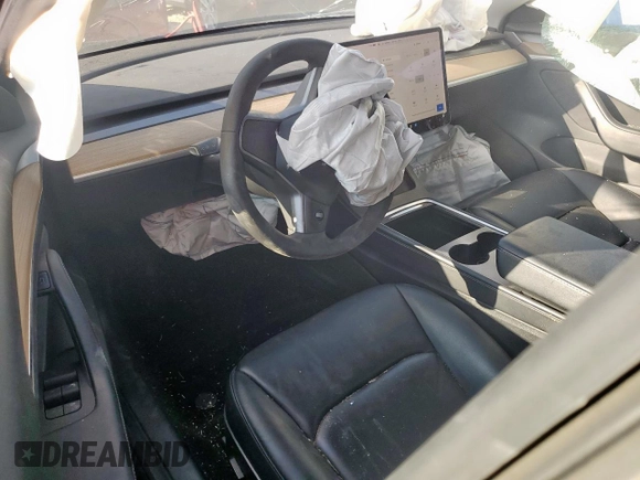 2021 Tesla Model 3 Standard Range Plus with VIN 5YJ3E1EA2MF977007, listed as a Copart auction lot 48516075 with Not Provided miles and Salvage Title. Bid and sale history available at DreamBid. Image 8.