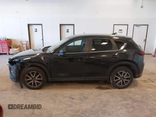 2018 Mazda CX-5 Touring with VIN JM3KFBCM9J0437490, listed as a IAAI auction lot 42006998 with 176,959 mi miles. Bid and sale history available at carsss.com. Image 14.