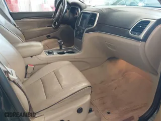 2014 Jeep Grand Cherokee Overland with VIN 1C4RJFCT7EC187319, listed as a IAAI auction lot 41256107 with 98,287 mi miles. Bid and sale history available at carsss.com. Image 5.