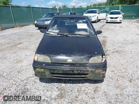 1993 Geo Metro z VIN JG1MR3363PK200242, wystawiony jako IAAI lot #42173417 z przebiegiem 151 862 mil mil oraz . Historia ofert i sprzedaży dostępna na DreamBid. Obrazek 6.