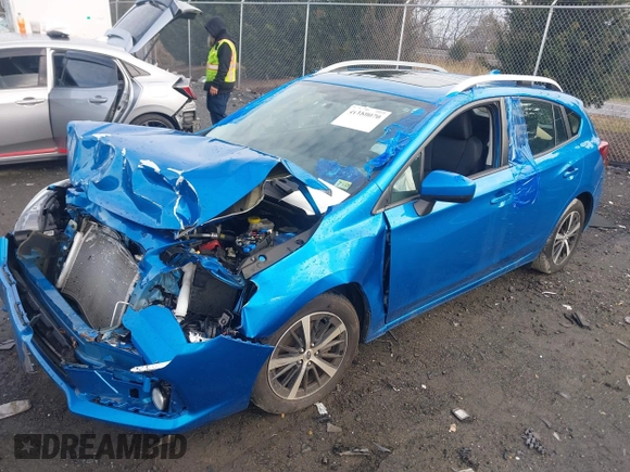 2023 Subaru Impreza Premium with VIN 4S3GTAD62P3700119, listed as a IAAI auction lot 41180070 with 20,853 mi miles and . Bid and sale history available at DreamBid. Image 2.