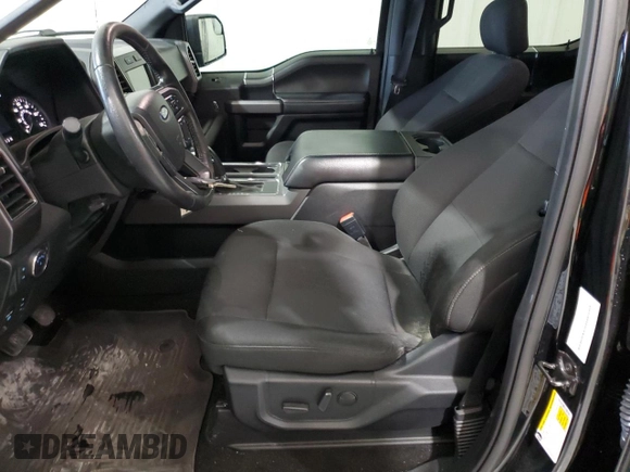 2020 Ford F-150 XL with VIN 1FTEW1CP9LFA53929, listed as a Copart auction lot 55599995 with 142,338 mi miles and Clean title. Bid and sale history available at DreamBid. Image 7.