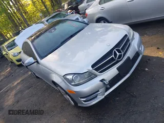 2015 Mercedes-Benz C with VIN WDDGJ4HB1FG372798, listed as a IAAI auction lot 41968536 with 56,007 mi miles. Bid and sale history available at carsss.com. Image 1.