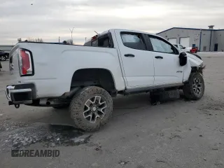 2022 GMC Canyon 4WD AT4 w/Cloth with VIN 1GTG6FEN5N1155598, listed as a Copart auction lot 41970495 with 57,572 mi miles and Salvage Title. Bid and sale history available at carsss.com. Image 3.