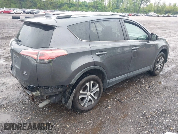 2017 Toyota RAV4 LE with VIN 2T3BFREV5HW603663, listed as a IAAI auction lot 42221653 with 102,734 mi miles and . Bid and sale history available at DreamBid. Image 4.