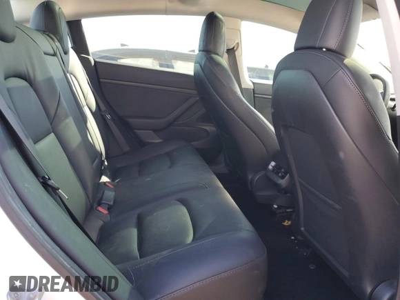 2020 Tesla Model 3 Standard Range Plus with VIN 5YJ3E1EA4LF799597, listed as a Copart auction lot 76401374 with 77,506 mi miles and Salvage Title. Bid and sale history available at DreamBid. Image 10.