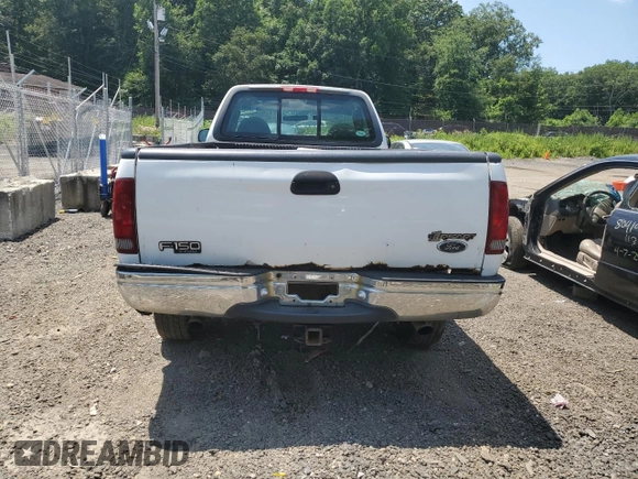 2000 Ford F-150 XL с VIN 1FTPF18L2YNA18807, выставлен на аукционе Copart как лот 62648305 с пробегом Не указан миль и Списание • Salvage title. История ставок и продаж доступна на DreamBid. Изображение 10.