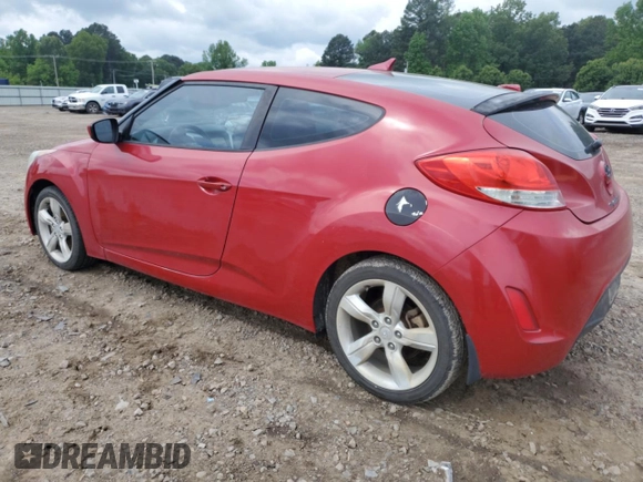 2013 Hyundai Veloster w/Black Int z VIN KMHTC6AD5DU173242, wystawiony jako Copart lot #54733125 z przebiegiem 157 766 mil mil oraz Czysty tytuł • Clean title. Historia ofert i sprzedaży dostępna na DreamBid. Obrazek 2.