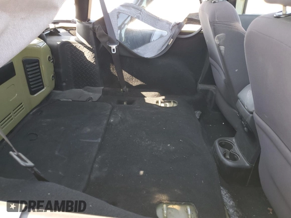 2013 Jeep Wrangler Sport with VIN 1C4AJWAG3DL649487, listed as a Copart auction lot 52568285 with 106,644 mi miles and Salvage title. Bid and sale history available at DreamBid. Image 11.