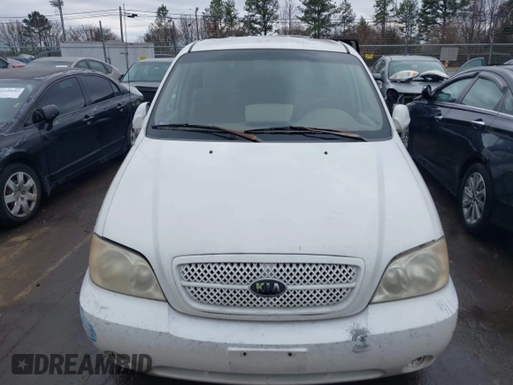 2004 Kia Sedona LX with VIN KNDUP131446537660, listed as a IAAI auction lot 41526183 with 282,891 mi miles. Bid and sale history available at carsss.com. Image 12.