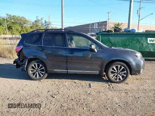 2017 Subaru Forester Touring with VIN JF2SJGTC3HH516646, listed as a IAAI auction lot 40560446 with 85,842 mi miles. Bid and sale history available at carsss.com. Image 13.