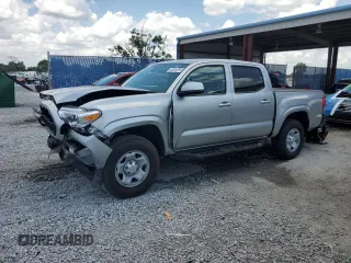 2023 Toyota Tacoma SR with VIN 3TMCZ5AN7PM575276, listed as a Copart auction lot 58305285 with 23,891 mi miles and Salvage title. Bid and sale history available at DreamBid. Image 1.