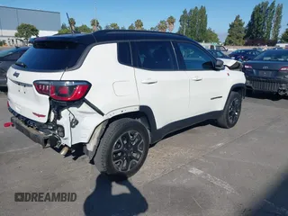 2020 Jeep Compass Trailhawk with VIN 3C4NJDDB4LT144129, listed as a IAAI auction lot 42582688 with 67,112 mi miles and . Bid and sale history available at DreamBid. Image 4.