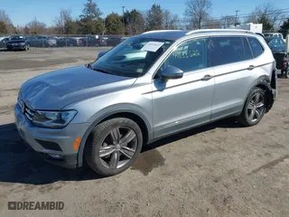 2020 Volkswagen Tiguan SE with VIN 3VV2B7AX0LM141970, listed as a IAAI auction lot 41633622 with 64,737 mi miles. Bid and sale history available at carsss.com. Image 2.