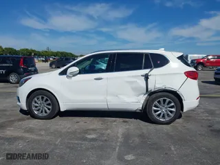 2020 Buick Envision Essence with VIN LRBFXCSA5LD150968, listed as a IAAI auction lot 41443356 with 71,993 mi miles. Bid and sale history available at carsss.com. Image 14.