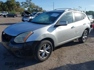 2009 Nissan Rogue SL with VIN JN8AS58T39W047497, listed as a IAAI auction lot 41792950 with 176,931 mi miles and . Bid and sale history available at DreamBid. Image 17.