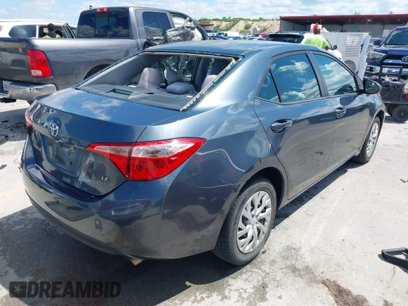2018 Toyota Corolla L with VIN 5YFBURHE1JP832911, listed as a IAAI auction lot 42237901 with 92,158 mi miles and . Bid and sale history available at DreamBid. Image 4.