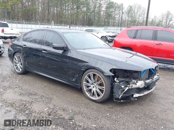 2018 BMW 5 Series M550i xDrive with VIN WBAJB9C59JB049114, listed as a IAAI auction lot 41543633 with 87,942 mi miles and . Bid and sale history available at carsss.com. Image 1.