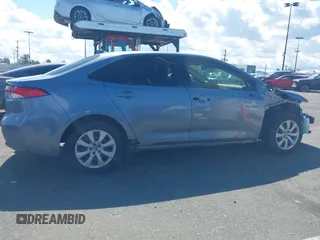2023 Toyota Corolla LE z VIN JTDB4MEE4P3005736, wystawiony jako IAAI lot #41739662 z przebiegiem 28 257 mil mil oraz . Historia ofert i sprzedaży dostępna na DreamBid. Obrazek 14.