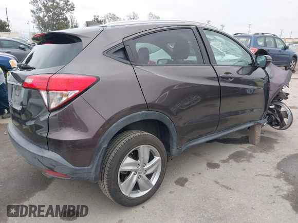2019 Honda HR-V EX with VIN 3CZRU5H55KM718842, listed as a IAAI auction lot 42022063 with 59,610 mi miles. Bid and sale history available at carsss.com. Image 4.