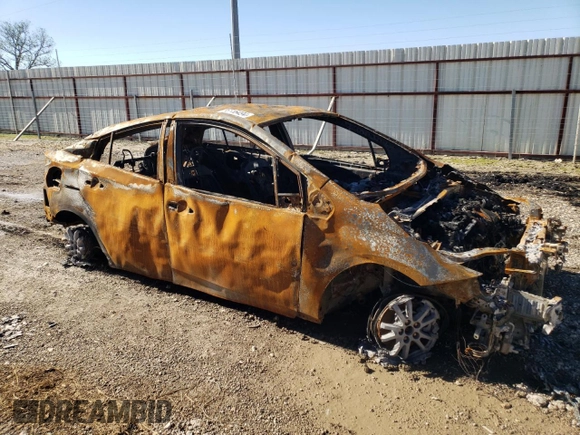 2021 Toyota Prius LE with VIN JTDKAMFP3M3173159, listed as a Copart auction lot 86616494 with Not provided miles and Salvage title. Bid and sale history available at DreamBid. Image 4.