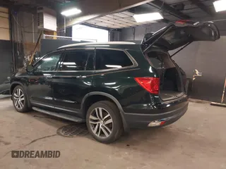 2016 Honda Pilot Touring with VIN 5FNYF6H98GB035226, listed as a IAAI auction lot 42022957 with 103,842 mi miles and . Bid and sale history available at DreamBid. Image 3.