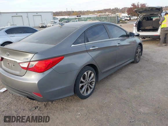 2014 Hyundai Sonata Limited with VIN 5NPEC4AB9EH897799, listed as a IAAI auction lot 40771774 with 221,000 mi miles and . Bid and sale history available at DreamBid. Image 4.