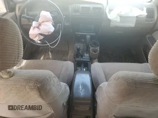 1996 Toyota 4Runner SR5 z VIN JT3HN86R3T0027632, wystawiony jako Copart lot #58767325 z przebiegiem 356 002 mil mil oraz Szkoda całkowita • Salvage title. Historia ofert i sprzedaży dostępna na DreamBid. Obrazek 8.