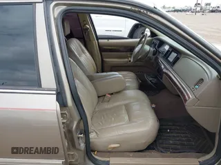 2004 Mercury Grand Marquis GS with VIN 2MEFM74W94X671873, listed as a IAAI auction lot 42130841 with 92,757 mi miles and . Bid and sale history available at DreamBid. Image 5.