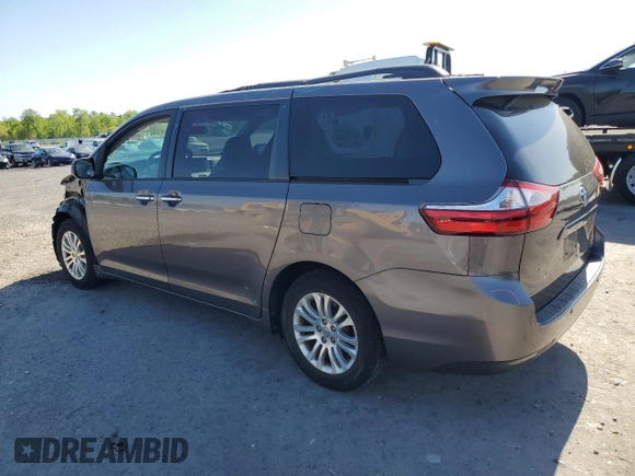 2016 Toyota Sienna XLE with VIN 5TDYK3DC6GS727718, listed as a Copart auction lot 54650605 with 90,380 mi miles and Salvage Title. Bid and sale history available at DreamBid. Image 2.
