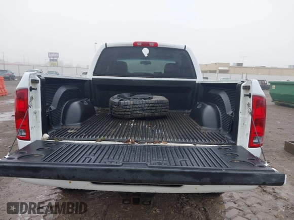 2003 Dodge 1500 SLT z VIN 1D7HU18N93J621948, wystawiony jako IAAI lot #41448520 z przebiegiem 200 091 mil mil oraz . Historia ofert i sprzedaży dostępna na DreamBid. Obrazek 17.