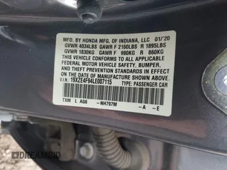 2020 Honda Insight Touring with VIN 19XZE4F94LE007115, listed as a IAAI auction lot 41819370 with 53,774 mi miles and . Bid and sale history available at carsss.com. Image 9.