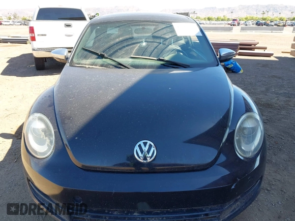 2013 Volkswagen Beetle 2.5L with VIN 3VWJP7ATXDM679115, listed as a IAAI auction lot 42212965 with Not Provided miles and . Bid and sale history available at DreamBid. Image 6.