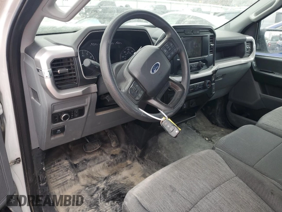 2023 Ford F-150 XL with VIN 1FTMF1CBXPKE33584, listed as a Copart auction lot 42448195 with 51,318 mi miles and Salvage title. Bid and sale history available at DreamBid. Image 8.