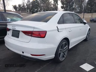 2019 Audi A3 Premium with VIN WAUAUGFF3KA101038, listed as a IAAI auction lot 41878582 with 61,726 mi miles and . Bid and sale history available at DreamBid. Image 4.
