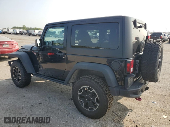 2015 Jeep Wrangler Rubicon Hard Rock z VIN 1C4BJWCG9FL714606, wystawiony jako Copart lot #68521014 z przebiegiem 35 187 mil mil oraz Szkoda całkowita • Salvage title. Historia ofert i sprzedaży dostępna na DreamBid. Obrazek 2.