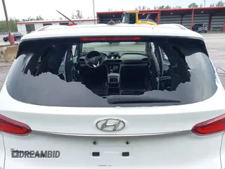 2019 Hyundai Santa Fe SE with VIN 5NMS23ADXKH038506, listed as a IAAI auction lot 42407399 with 54,540 mi miles and . Bid and sale history available at DreamBid. Image 18.