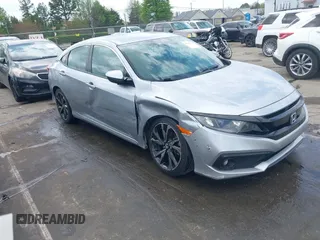2021 Honda Civic Sport with VIN 2HGFC2F88MH530214, listed as a IAAI auction lot 41968361 with 60,869 mi miles and . Bid and sale history available at DreamBid. Image 1.