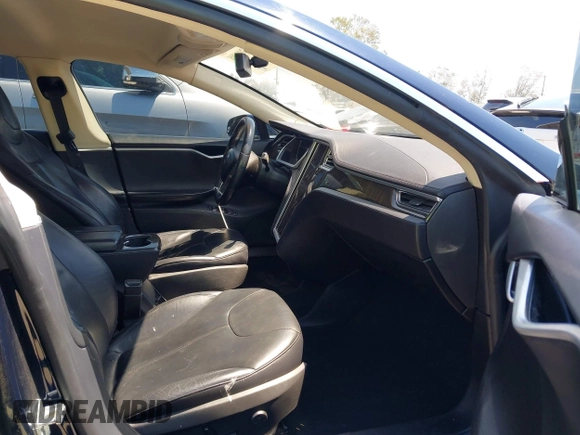 2013 Tesla Model S with VIN 5YJSA1DN1DFP05317, listed as a IAAI auction lot 42086998 with 150,964 mi miles. Bid and sale history available at carsss.com. Image 5.