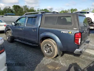 2018 Nissan Frontier Pro-4X with VIN 1N6DD0EV5JN702214, listed as a Copart auction lot 52802715 with 79,837 mi miles and Salvage title. Bid and sale history available at DreamBid. Image 2.