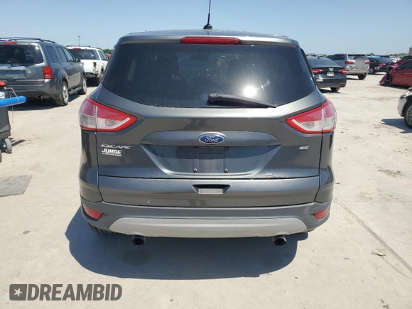 2016 Ford Escape SE z VIN 1FMCU0G77GUB95839, wystawiony jako Copart lot #56884815 z przebiegiem 138 978 mil mil oraz Czysty tytuł • Clean title. Historia ofert i sprzedaży dostępna na DreamBid. Obrazek 6.
