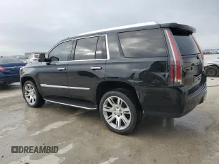 2018 Cadillac Escalade Luxury z VIN 1GYS3BKJ3JR370626, wystawiony jako Copart lot #86271134 z przebiegiem Nie podano mil oraz Szkody całkowita. Historia ofert i sprzedaży dostępna na DreamBid. Obrazek 2.