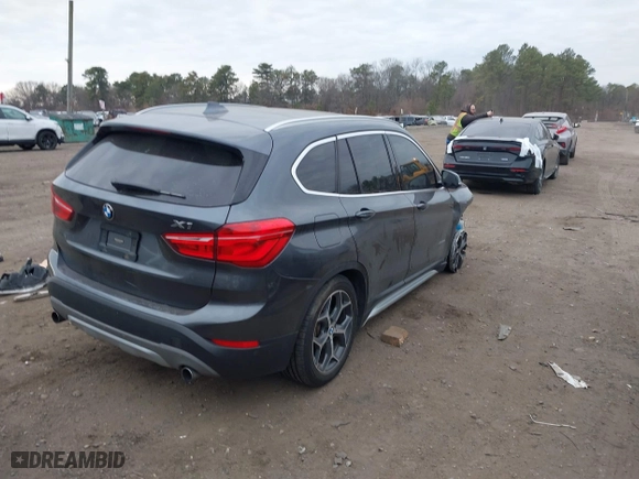 2017 BMW X1 xDrive28i with VIN WBXHT3C37H5F86637, listed as a IAAI auction lot 41300161 with 95,459 mi miles. Bid and sale history available at carsss.com. Image 4.
