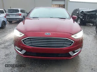 2018 Ford Fusion Titanium with VIN 3FA6P0D91JR233679, listed as a IAAI auction lot 42182140 with 100,706 mi miles and . Bid and sale history available at DreamBid. Image 12.